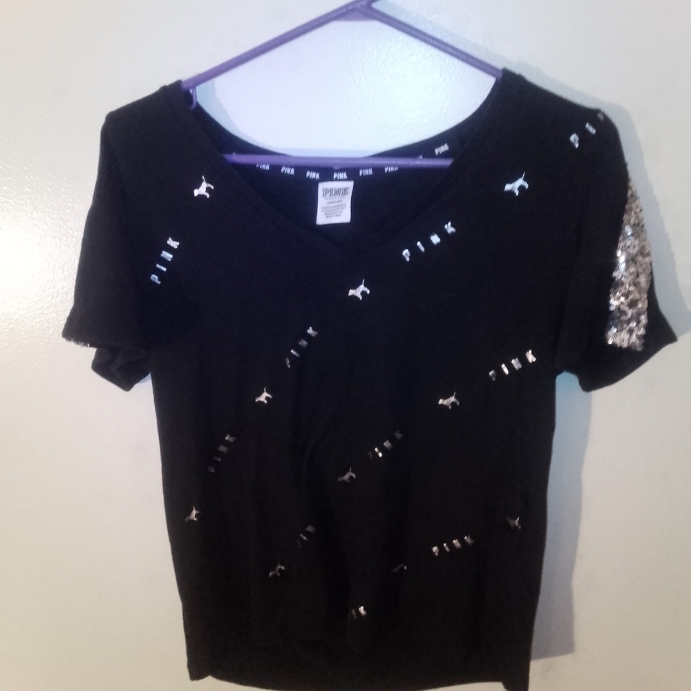 Pink shirt with sequin effect on the sleeves